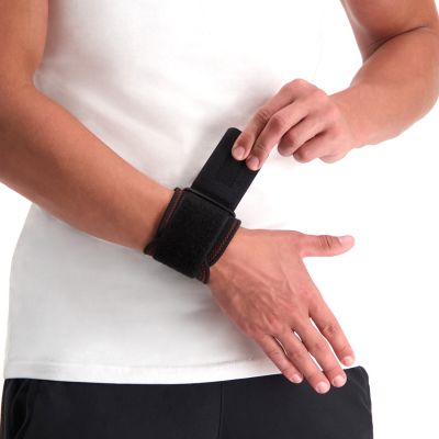 gladiator sports wrist wrap being pulled on